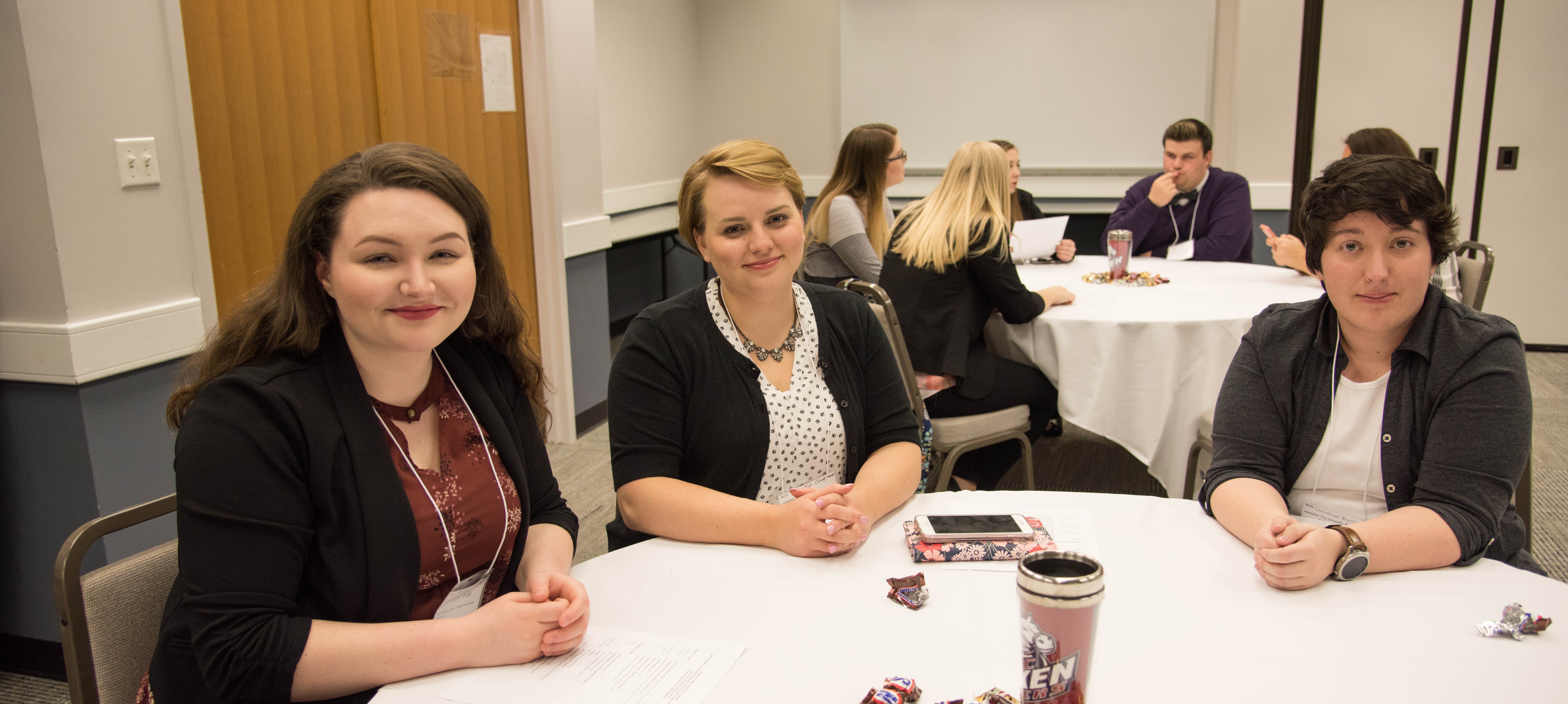 Women leaders stop for a photo at a conference held in the USCA Conference Center