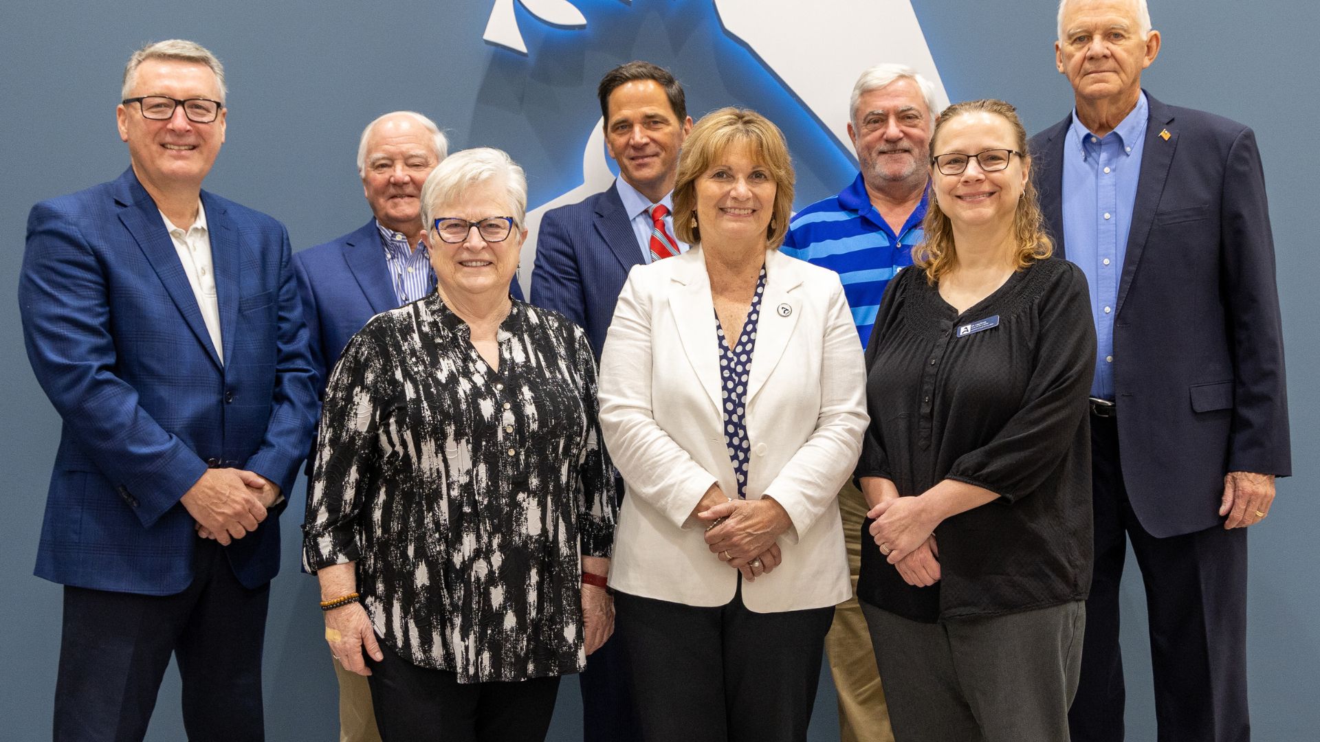 Front Row: Sally Jennings, Mary Driscoll, and Dr. Lisa Ennis; Back Row: R. Keith Wood, Ira “Bud” Coward, Chancellor Heimmermann, Tim Wertz, and George Mitchell