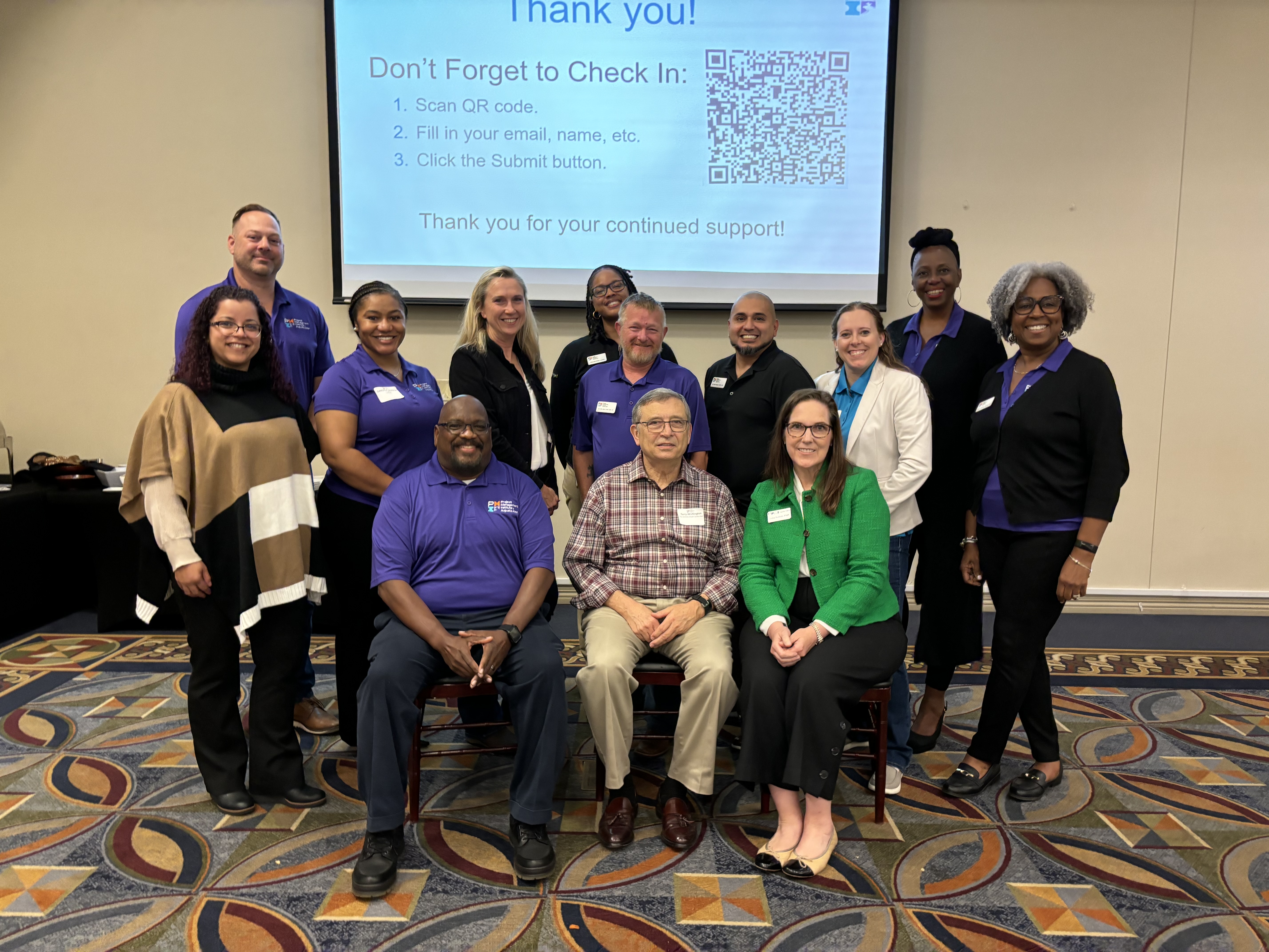 Dr. Terry Whittington, center, with Aiken/Augusta PMI Chapter members.