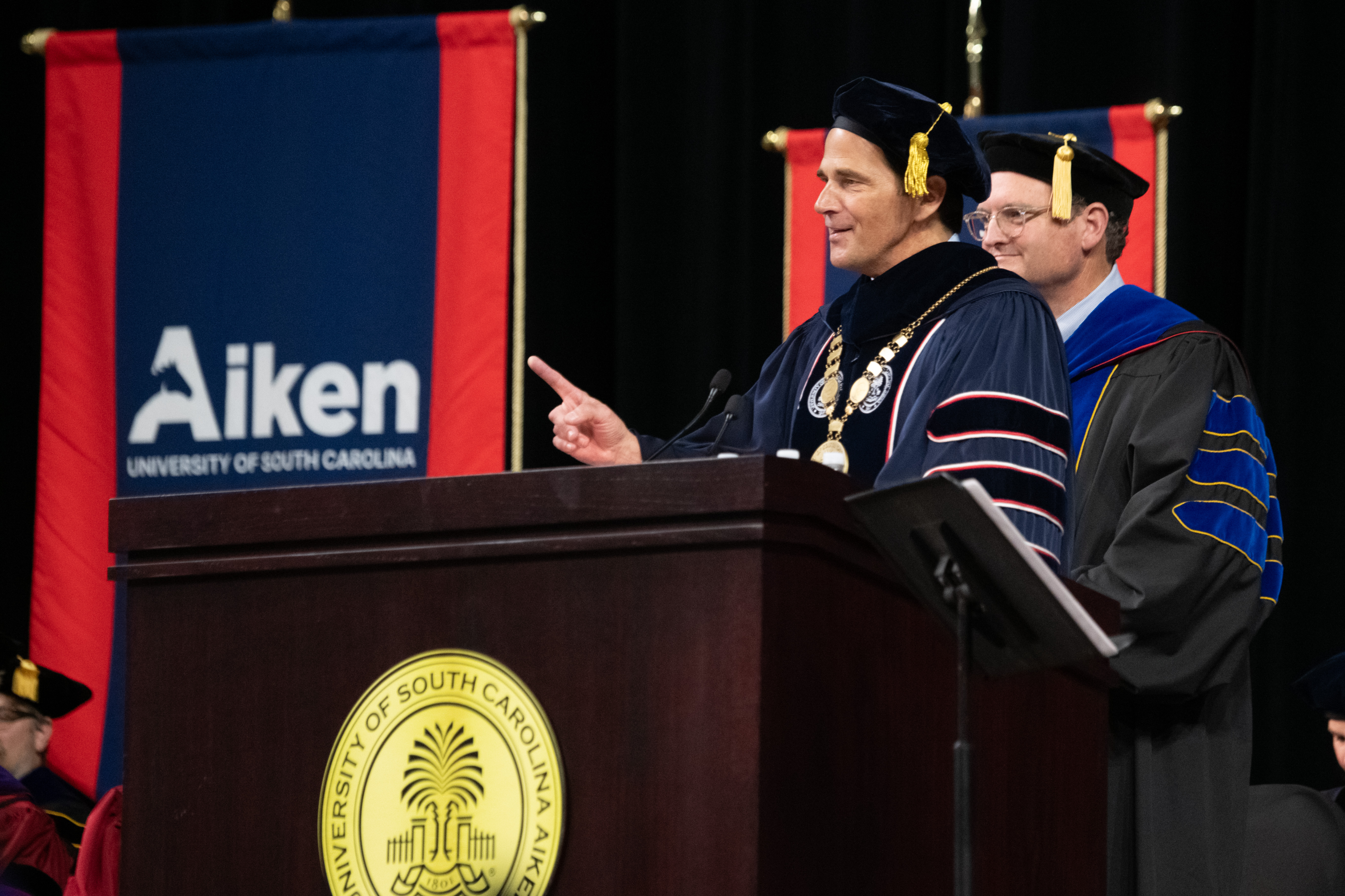 USCA Chancellor Daniel J. Heimmermann addressed the graduates with a message of optimism, emphasizing their potential to impact the world.