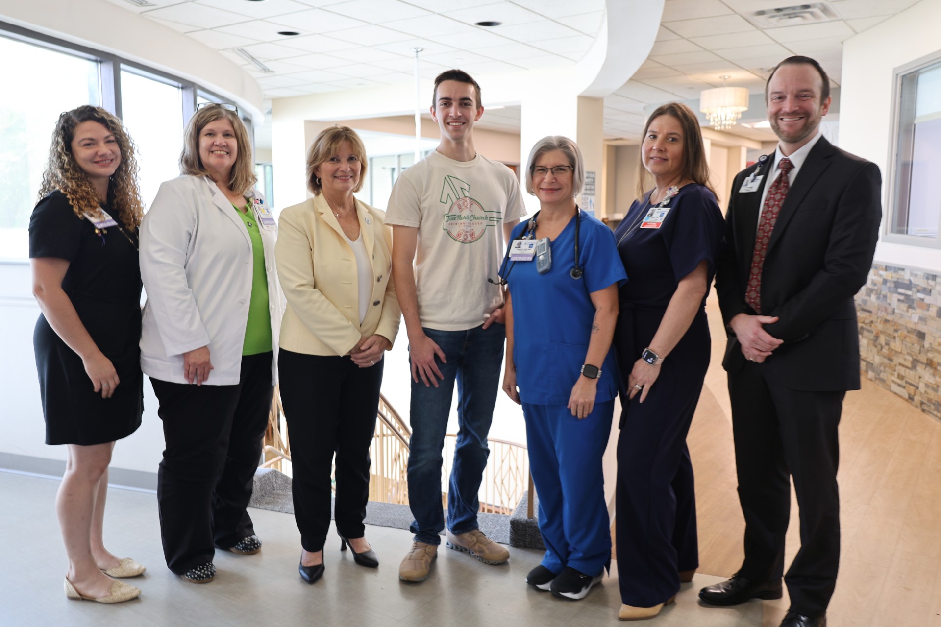(From left to right) Mikaela Minnear BSN, RN, C-EFM, Perinatal Educator, Teresa Lilly, RNC, Director of Women’s LifeCare Center, Mary Driscoll, Vice Chancellor for University Advancement James Saxon, scholarship recipient Jennifer Redd, BSN, RNC, Nursery, Dawn Shepeard, RN, Perinatal Nurse Manager, Matthew Merrifield, Chief Operation Officer,