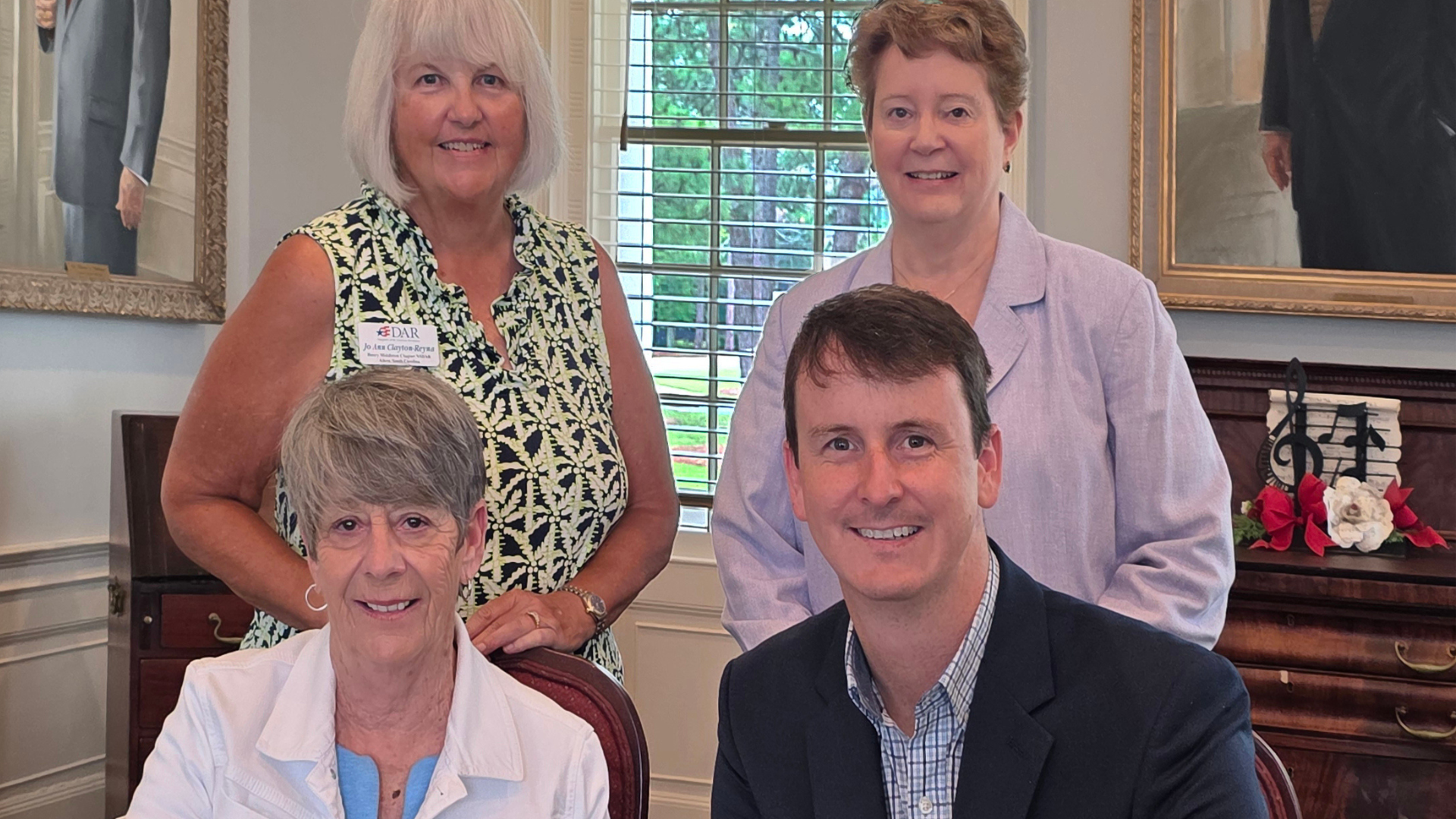 Margaret Davis (bottom left), the Henry Middleton Chapter regent recently joined Scholarship Committee Co-Chairs Jo Ann Clayton-Reyna (top left) and Terry Harley (top right) at the USCA Alumni House to sign the gift agreement to establish The Henry Middleton Chapter of the National Society Daughters of the American Revolution Scholarship.